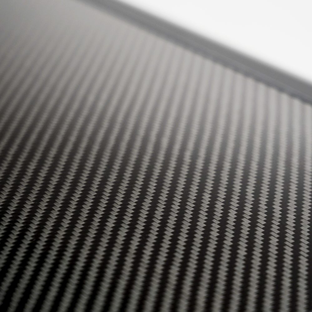 Carbon fibre twill weave of the Carbonlite shell, close up