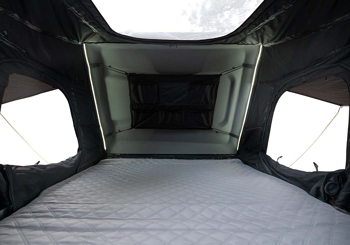 Inside the Roofnest Condor 2 showing the mattress and windows