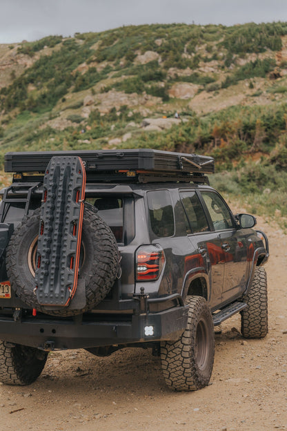 Intrepid Geo 2.5 closed on a 4Runner carrying recovery boards