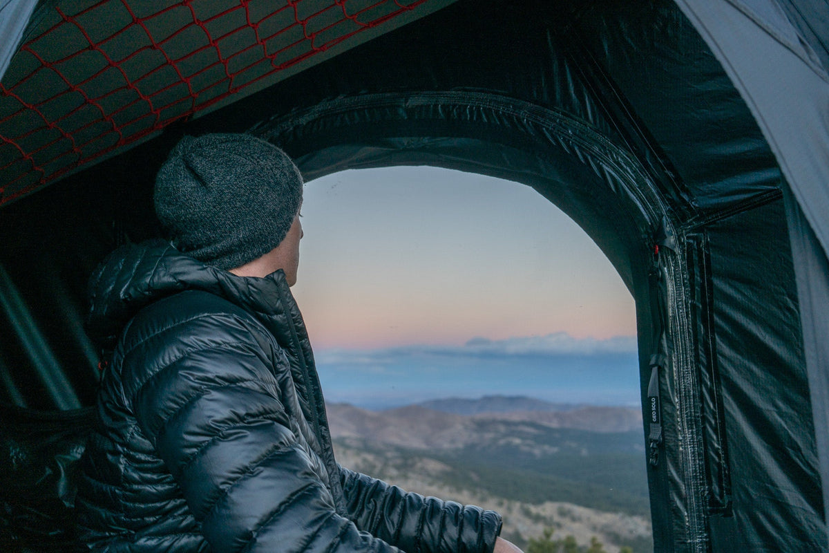 Looking out of the Intrepid Geo Solo at first light over the mountains