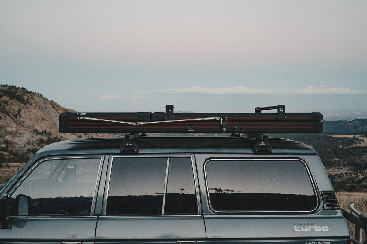 Intrepid Geo Solo closed, seen across the roof of a Land Cruiser