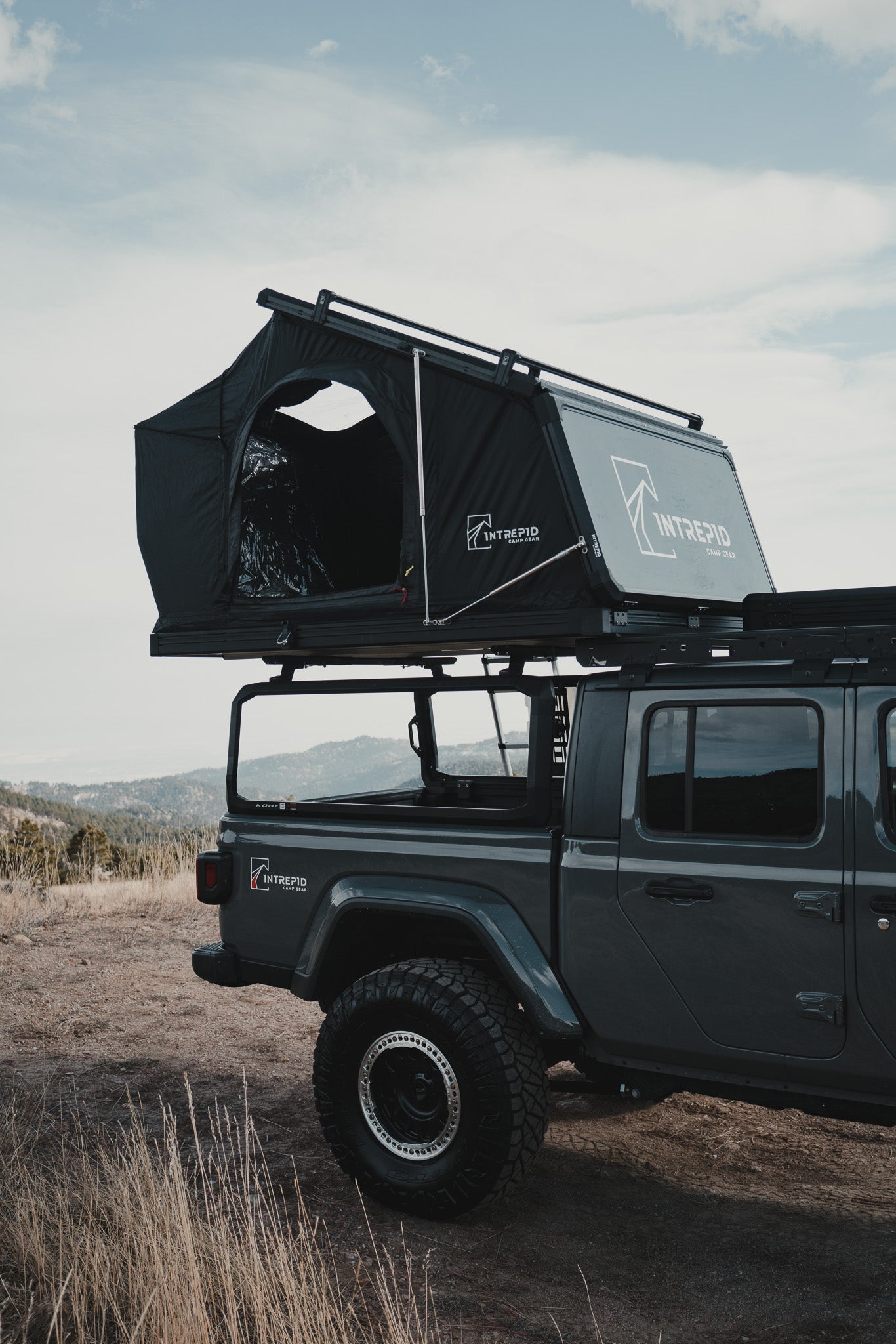 Intrepid Geo 3.0 Pro open on a Jeep Gladiator bed rack in the foothills