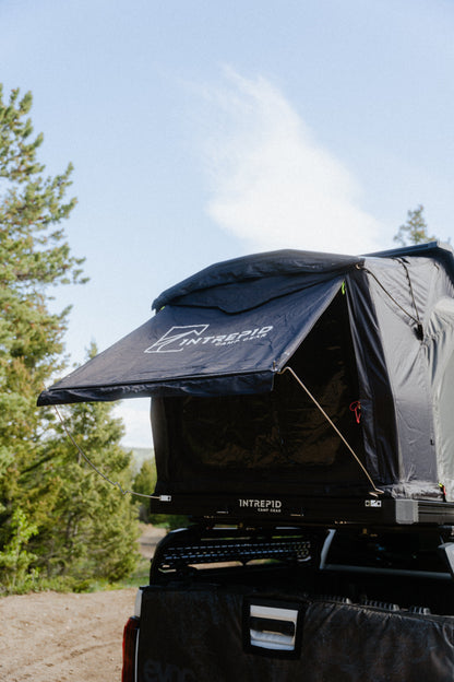 Intrepid Geo 3.0 Pro on a pickup bed rack with the door canopy propped out over the entrance