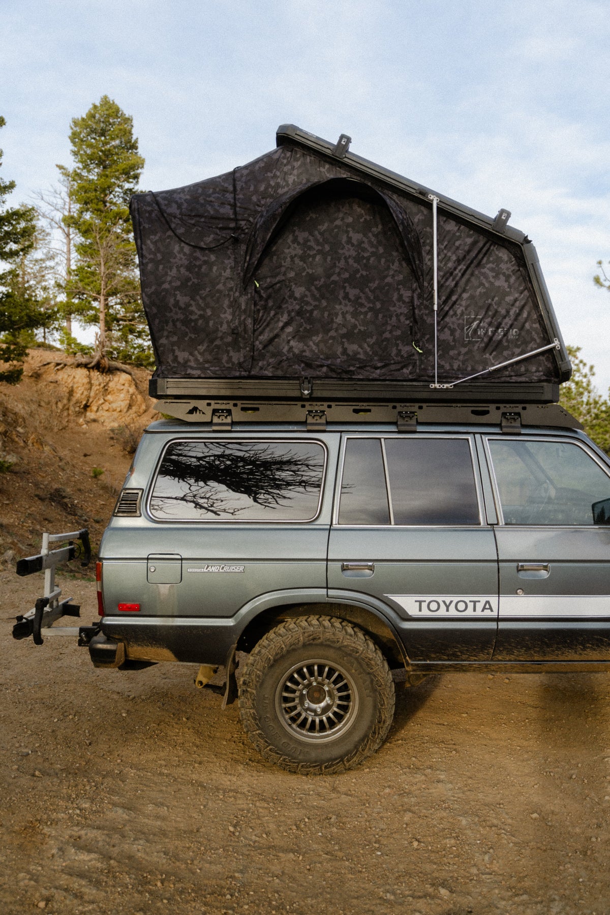 Intrepid Geo 2.5 Pro in Camo, open on a Land Cruiser
