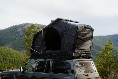 Intrepid Geo 2.5 Pro in Camo, open at a mountain camp