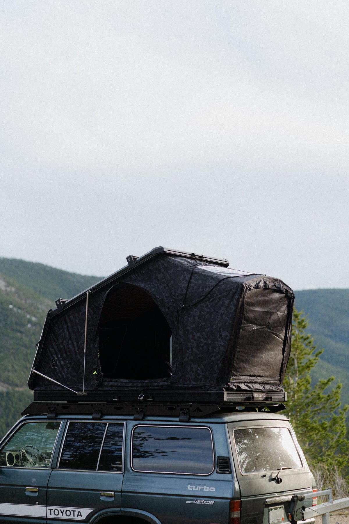 Intrepid Geo 2.5 Pro in Camo on a Land Cruiser, seen from the front