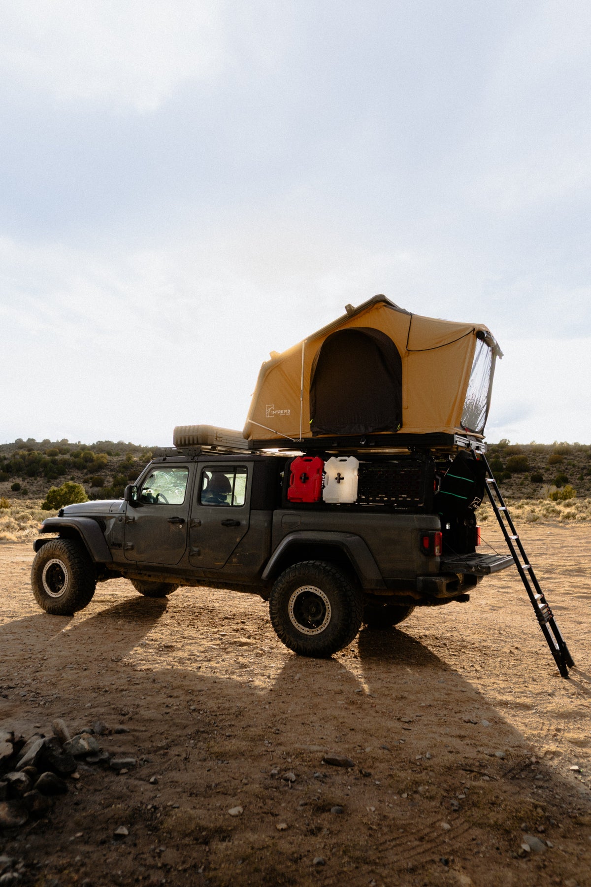 Intrepid Geo 2.5 Pro in Coyote Brown, open on a Jeep Gladiator