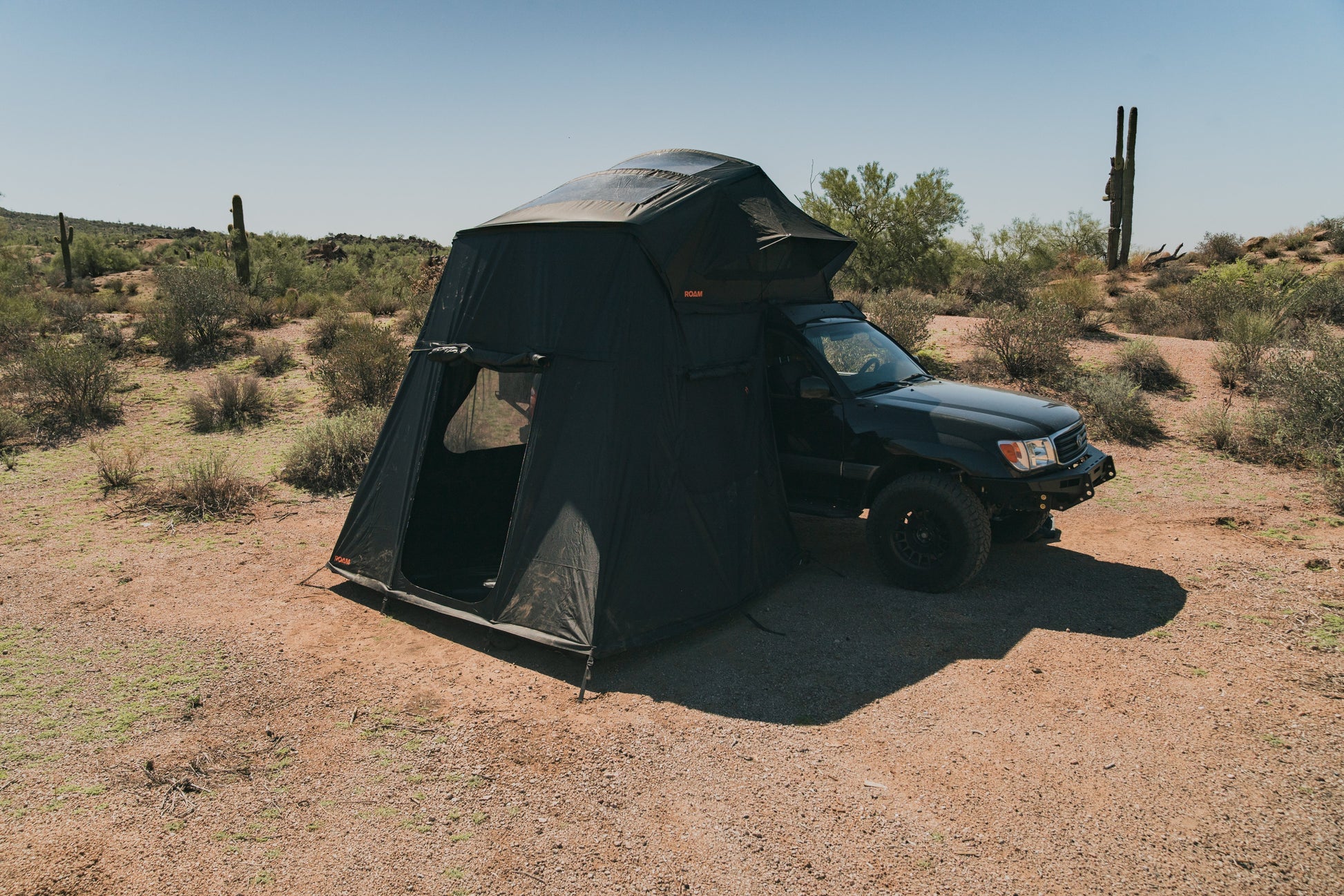 ROAM Vagabond XL 2.0 annex room seen from the side, in the desert