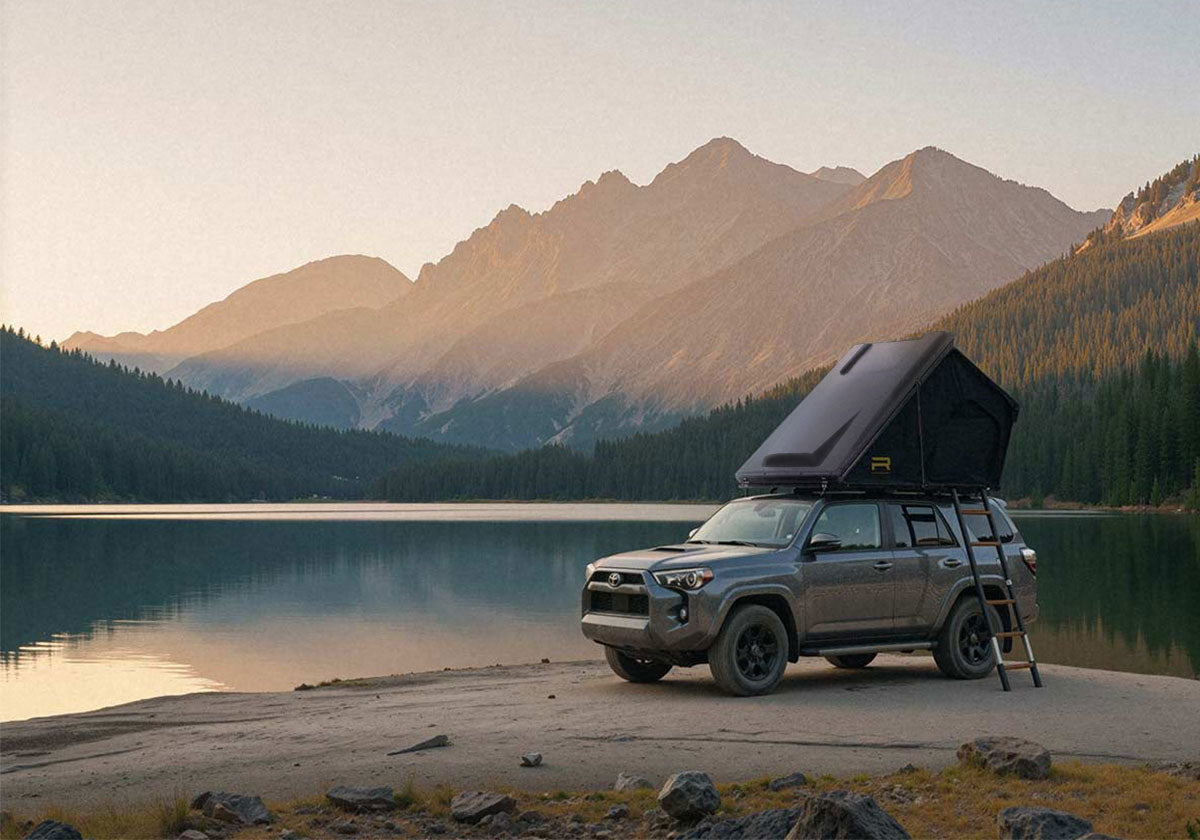 Roofnest Falcon 3 EVO XL Air open on a 4Runner beside a mountain lake