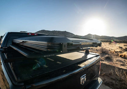 Roofnest Falcon 3 EVO closed on a RAM pickup at sunset